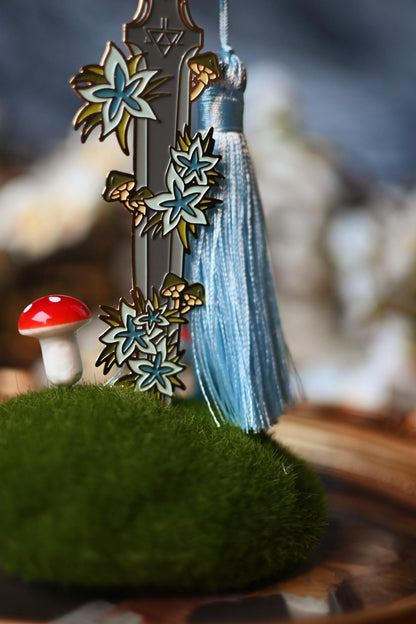 No0neDesigns Link's Master Sword enamel bookmark close up picture showing the detail of Hyrule florals and shrooms.