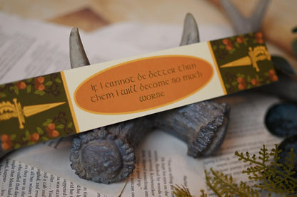 The reverse side of No One Designs book spine bookmark inspired by The Crueld Prince featuring the quote: If I cannot be better than them I will become so much worse. 