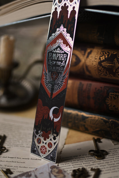 Decorative bookmark with 'Empire of the Vampire' design on a book and candle background