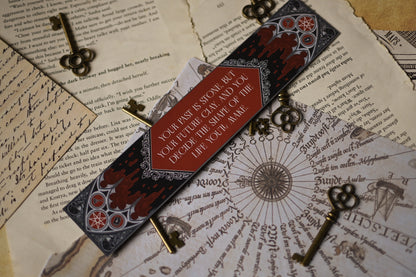 Decorative bookmark with text and keys on an old document background