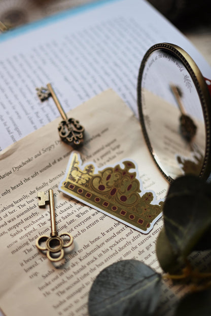 Inspired by V.E Schwab's A Darker Shade of Magic trilogy, the sticker is at a distance with the shine of natural light highlighting the golden foil shine. 