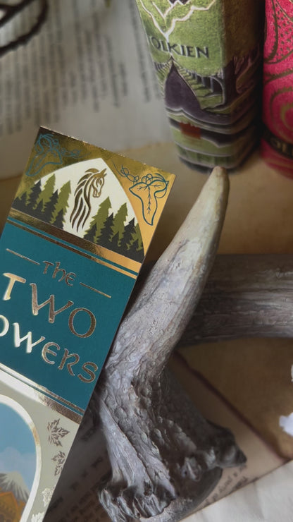 Close up video showcasing all the details of the No0neDesigns The Two Towers inspired book spine bookmark; showcasing the small illustrations and foil detailing.
