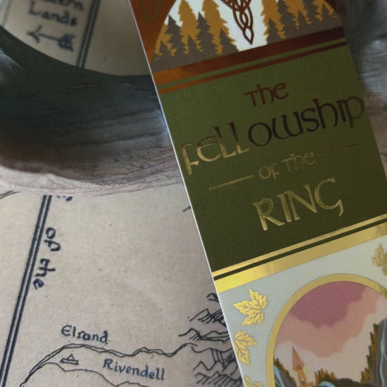A small video showcasing the close up details of the no0nedesigns inspired fellowship of the ring book spine bookmark.