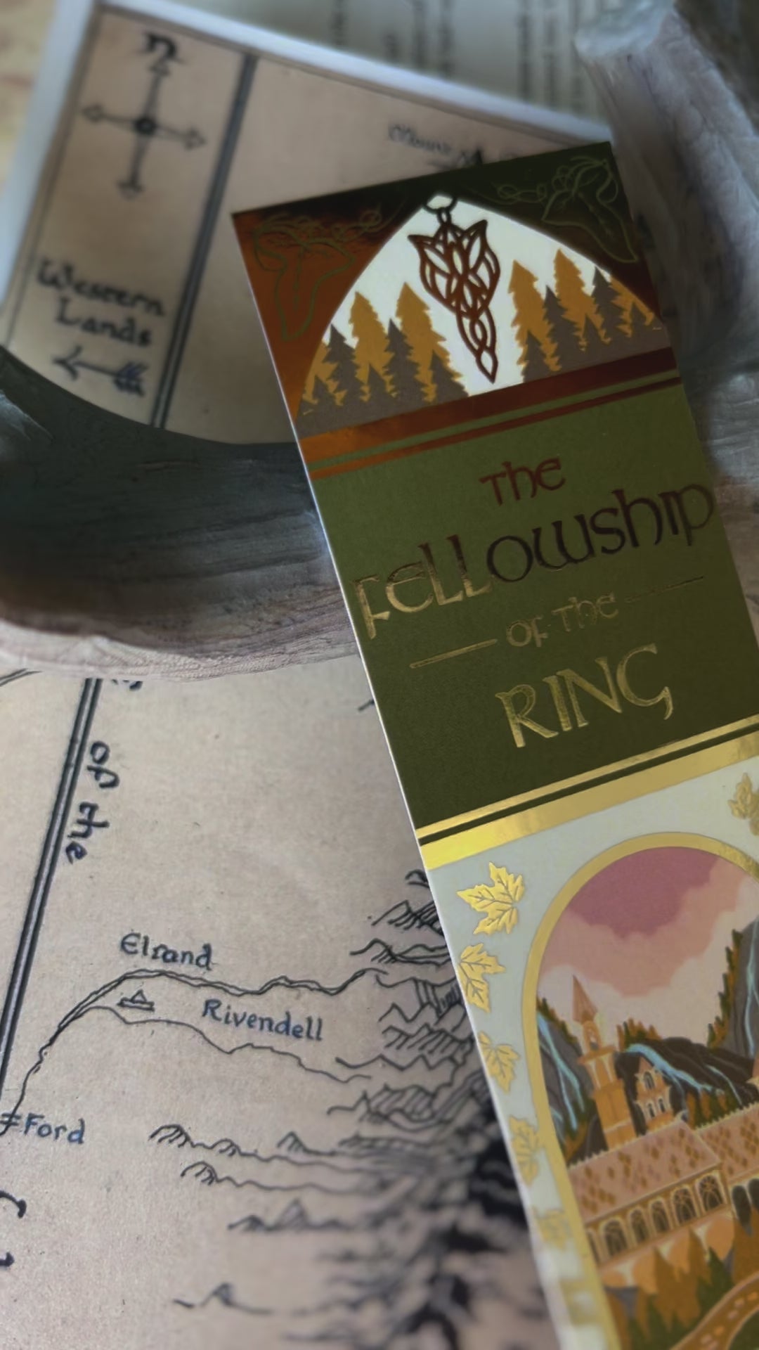 A small video showcasing the close up details of the no0nedesigns inspired fellowship of the ring book spine bookmark.